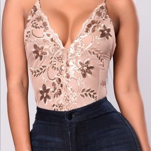 Never been worn sequin bodysuit from fashionnova